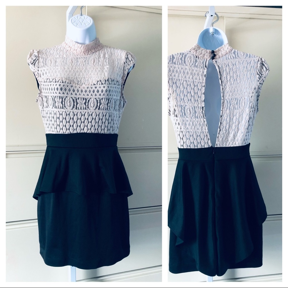 Mystic Women's Sleeveless, Lace, Peplum Hem Dress.
Three Button Closure